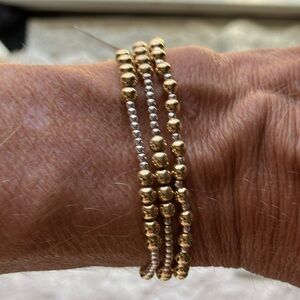 3 e-newton stretchy slip on bracelets.